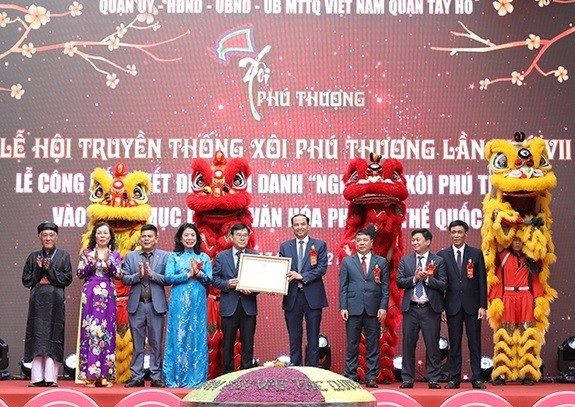 Quận Tây Hồ đón nhận Quyết định ghi danh  Ghi danh Nghề làm xôi Phú Thượng là Di sản văn hóa phi vật thể Quốc gia