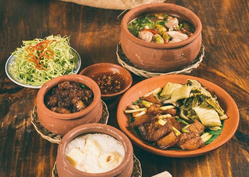 Nồi đất được sử dụng để nấu nhiều món ăn Việt hấp dẫn thực khách. hấp dẫn thực khác Nồi đất được sử dụng để nấu nhiều món ăn Việt hấp dẫn thực khách. hấp dẫn thực khác