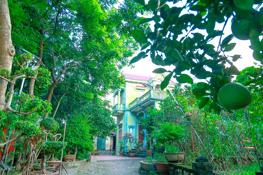 Không gian nhà ở xanh - sạch - đẹp bên vườn cây ăn quả của gia đình ông Hải. Ảnh: Trà Hương Không gian nhà ở xanh - sạch - đẹp bên vườn cây ăn quả của gia đình ông Hải. Ảnh: Trà Hương