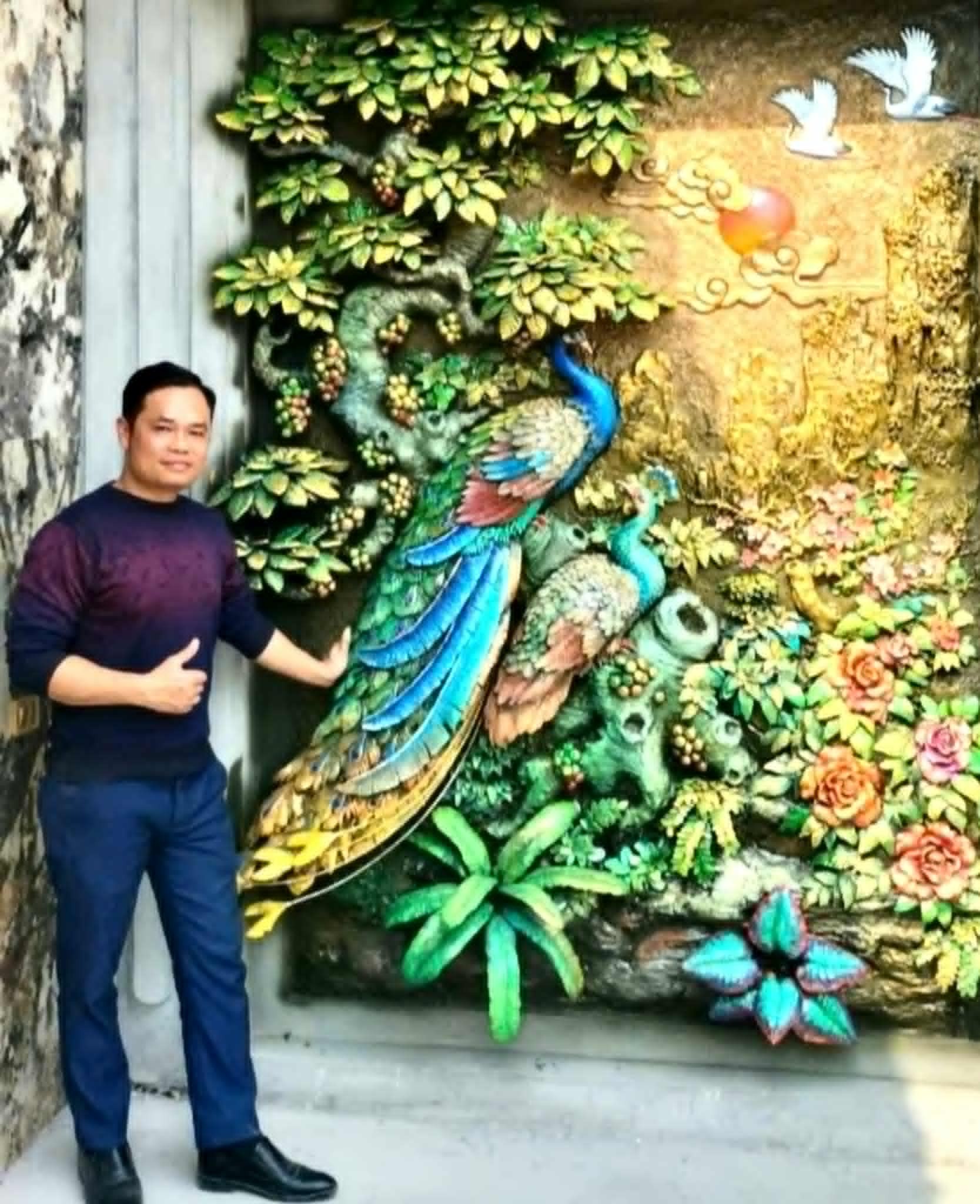 Nghệ nhân điêu khắc Lê Hữu Trí góp phần làm đẹp cảnh quan môi trường nông thôn mới