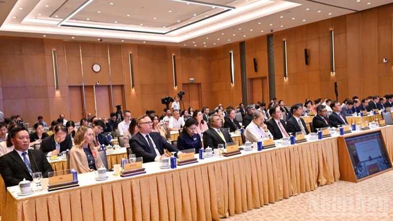 Các đại biểu trong nước và quốc tế tham dự buổi lễ. (Ảnh: TRẦN HẢI) Các đại biểu trong nước và quốc tế tham dự buổi lễ. (Ảnh: TRẦN HẢI)