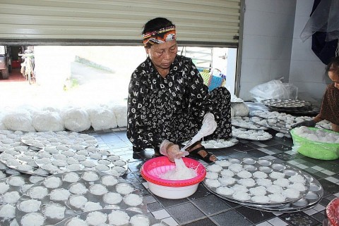 hon nua the ky giu nghe bun banh dong quang
